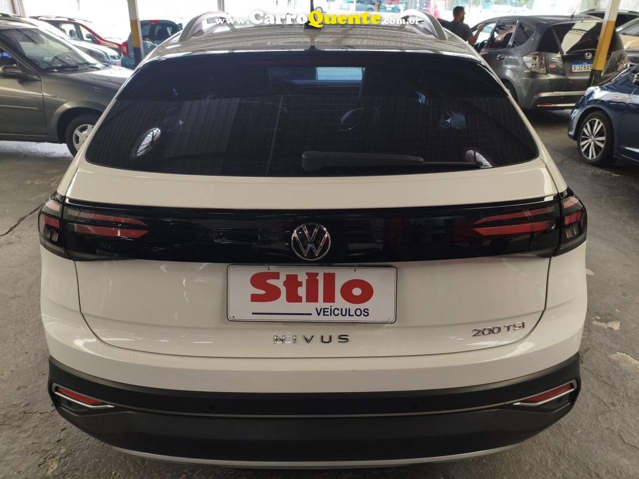 VOLKSWAGEN   NIVUS HIGHLINE 1.0 200 TSI FLEX AUT.   BRANCO 2023 1.0 FLEX - Loja