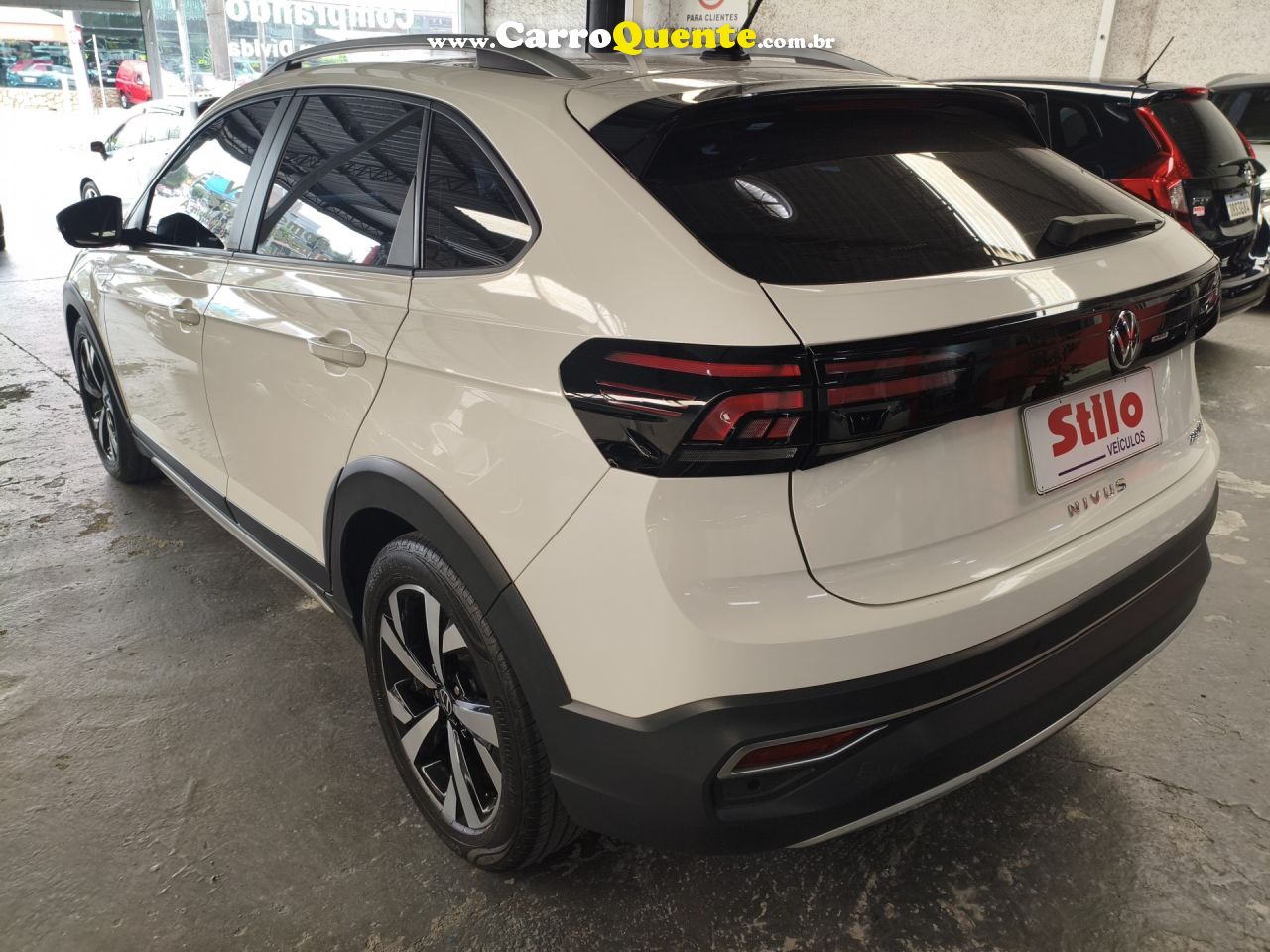 VOLKSWAGEN   NIVUS HIGHLINE 1.0 200 TSI FLEX AUT.   BRANCO 2023 1.0 FLEX - Loja