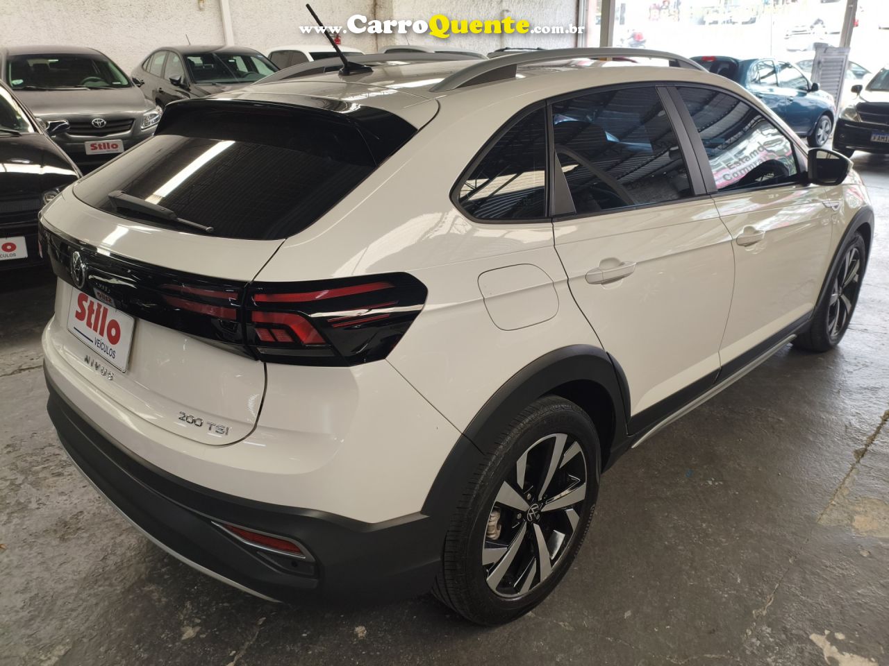 VOLKSWAGEN   NIVUS HIGHLINE 1.0 200 TSI FLEX AUT.   BRANCO 2023 1.0 FLEX - Loja