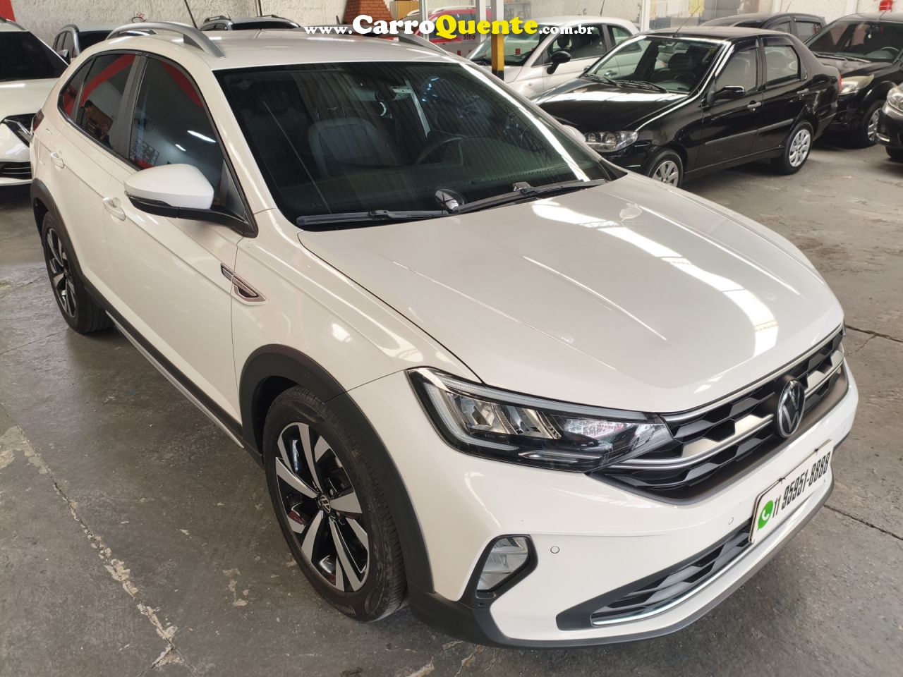 VOLKSWAGEN   NIVUS HIGHLINE 1.0 200 TSI FLEX AUT.   BRANCO 2023 1.0 FLEX - Loja