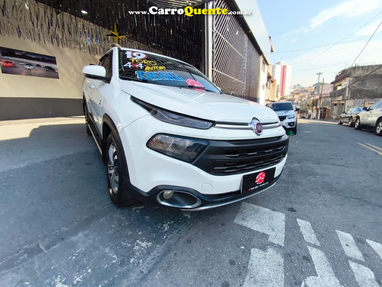 FIAT   TORO FREEDOM 2.0 16V 4X4 DIESEL AUT.   BRANCO 2019 2.0 DIESEL - Loja