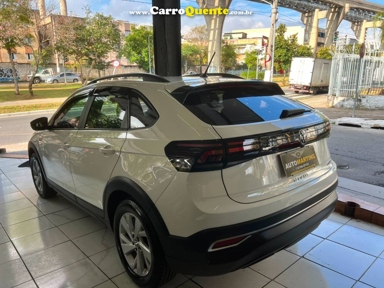 VOLKSWAGEN NIVUS 1.0 200 TSI TOTAL COMFORTLINE 2023 - Loja