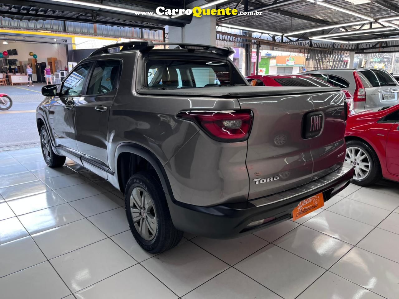 FIAT   TORO FREEDOM AT6   CINZA 2021 1.8 FLEX - Loja