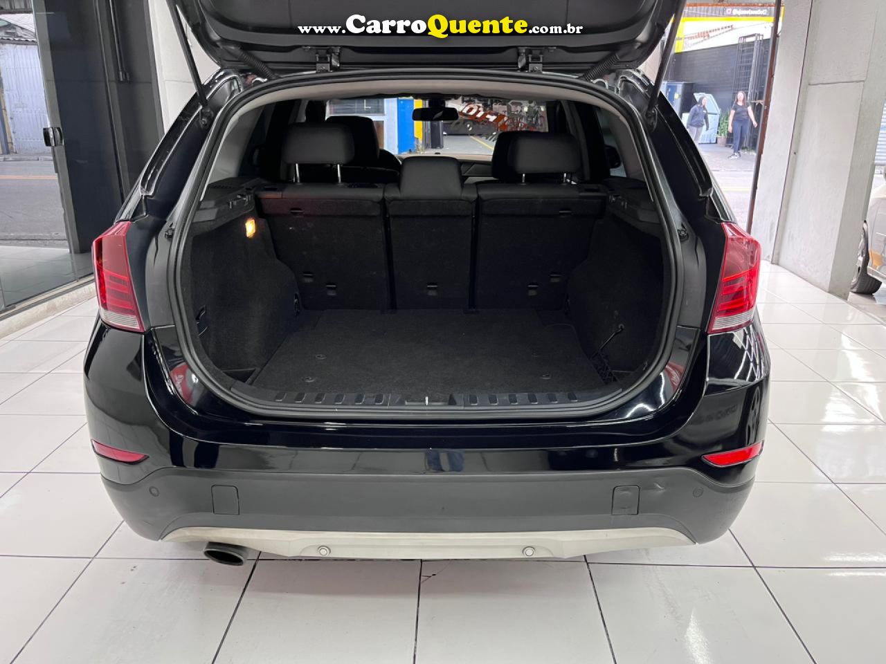 BMW   BMW X1 SDRIVE1 8I VL 31   PRETO 2013 2.0 GASOLINA - Loja