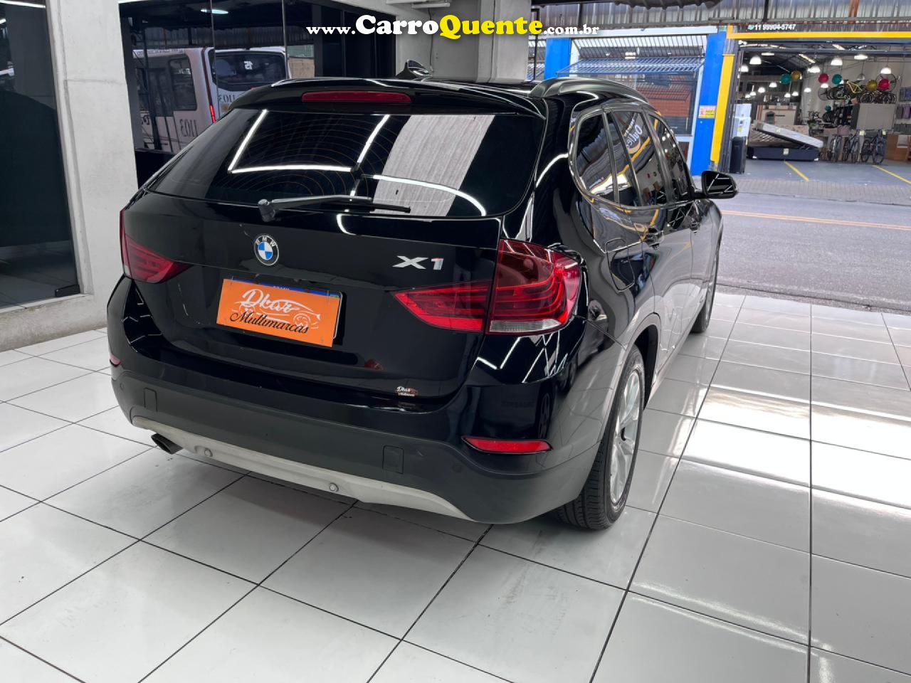 BMW   BMW X1 SDRIVE1 8I VL 31   PRETO 2013 2.0 GASOLINA - Loja