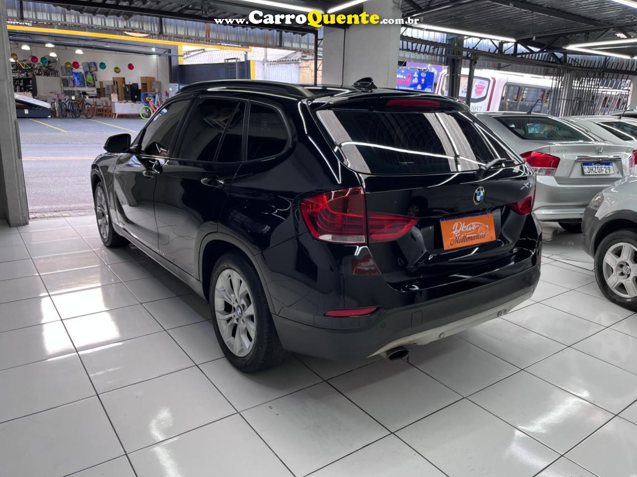 BMW   BMW X1 SDRIVE1 8I VL 31   PRETO 2013 2.0 GASOLINA - Loja