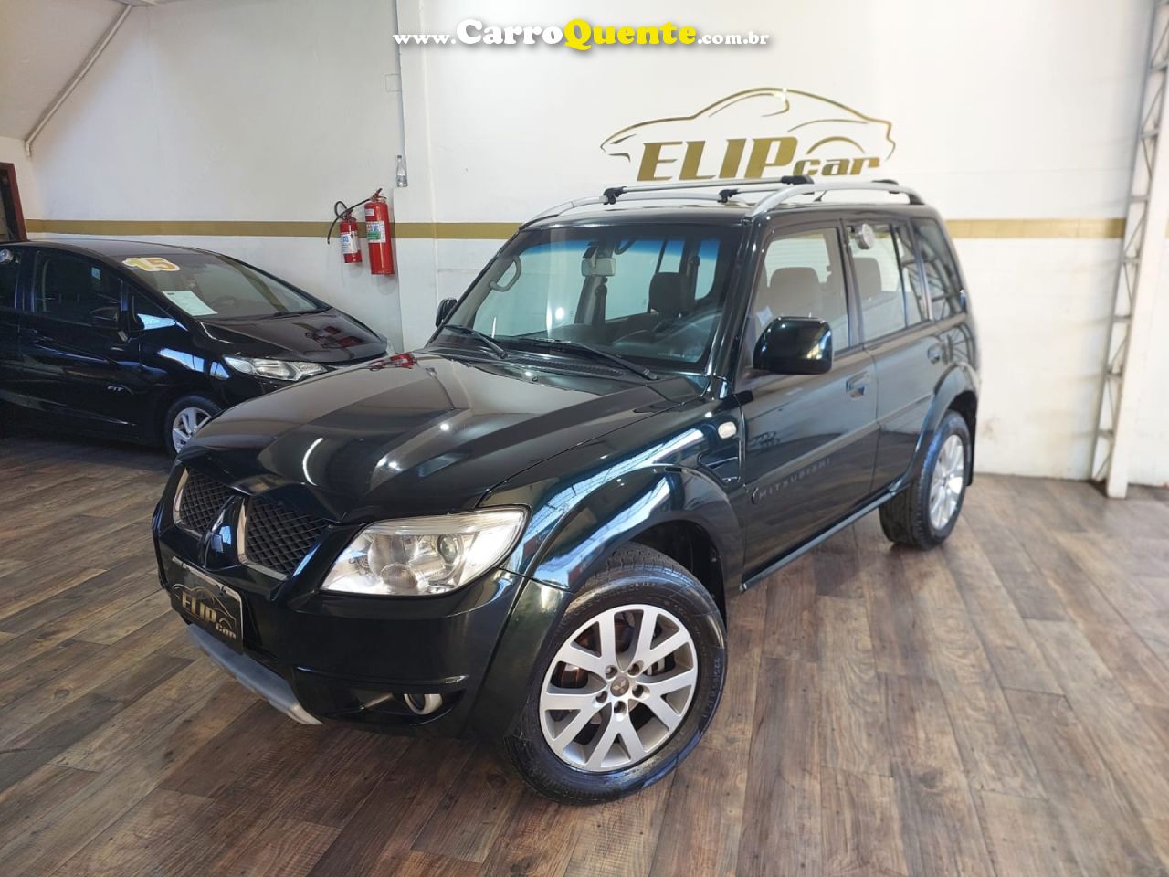 MITSUBISHI   PAJERO TR4 2.0 FLEX 16V 4X2 AUT.   VERDE 2012 2.0 FLEX - Loja