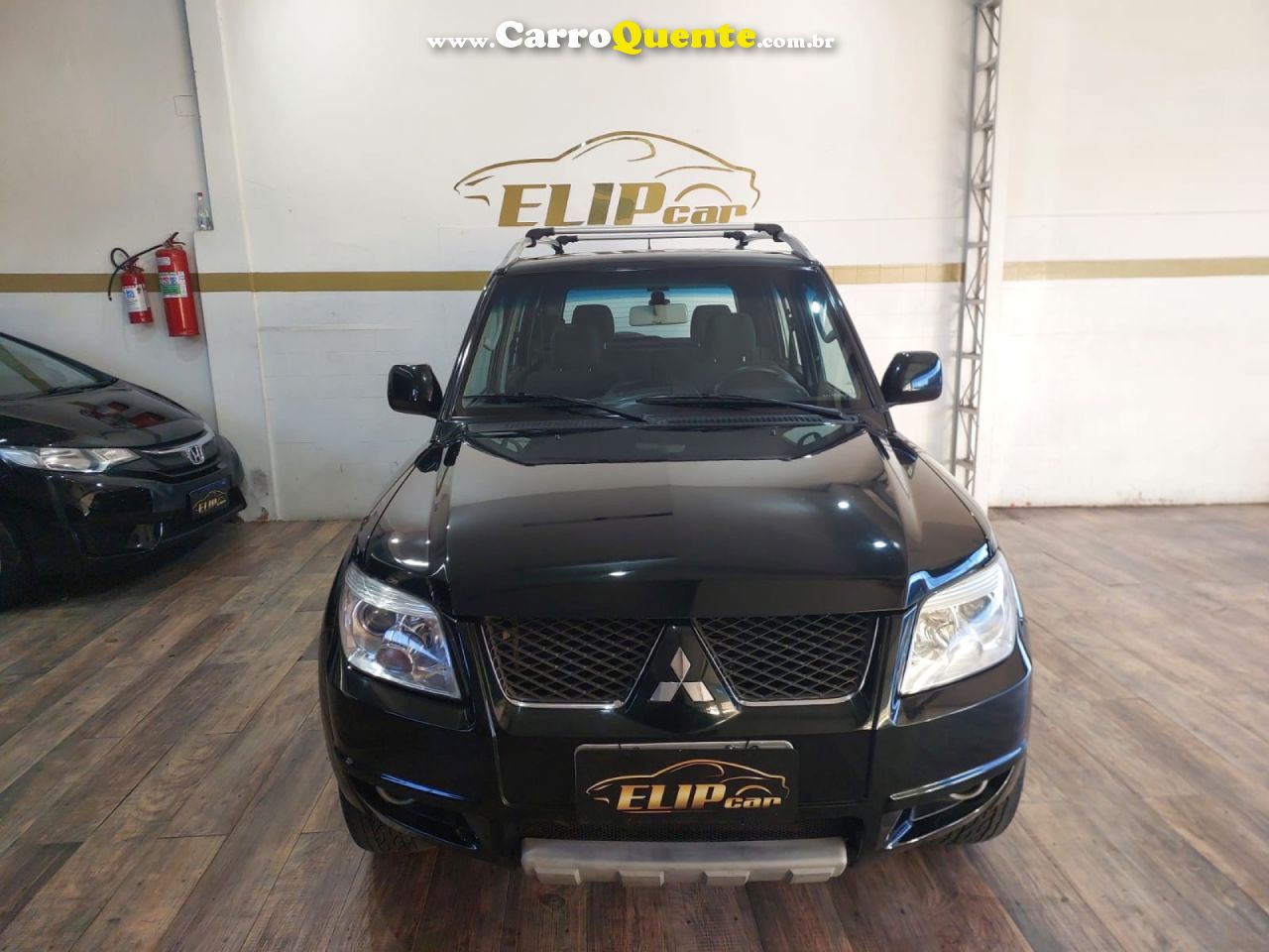 MITSUBISHI   PAJERO TR4 2.0 FLEX 16V 4X2 AUT.   VERDE 2012 2.0 FLEX - Loja