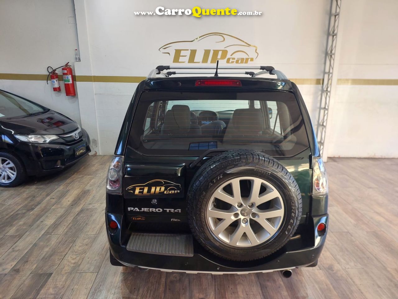 MITSUBISHI   PAJERO TR4 2.0 FLEX 16V 4X2 AUT.   VERDE 2012 2.0 FLEX - Loja