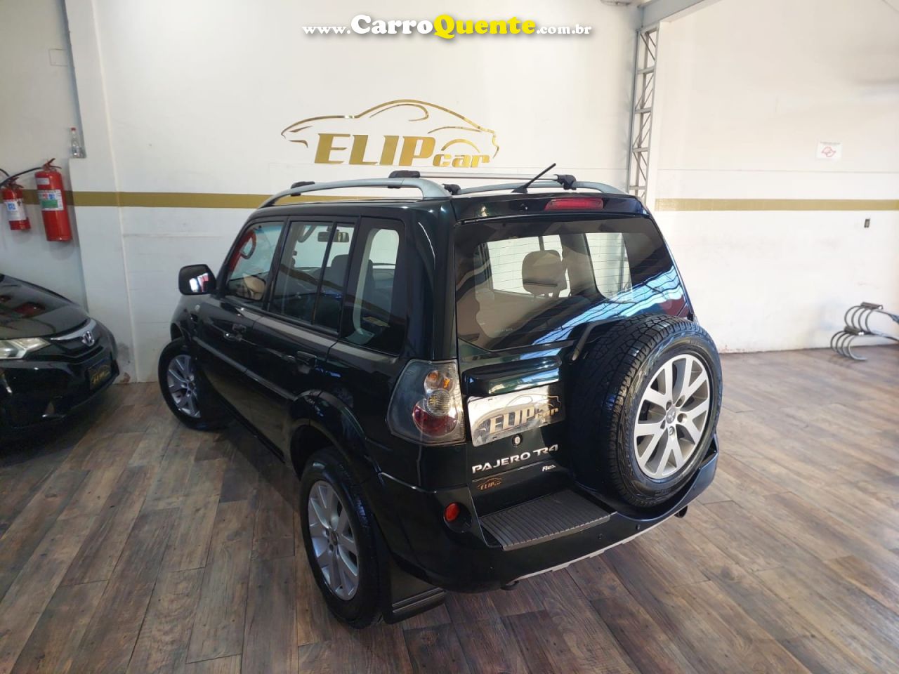 MITSUBISHI   PAJERO TR4 2.0 FLEX 16V 4X2 AUT.   VERDE 2012 2.0 FLEX - Loja