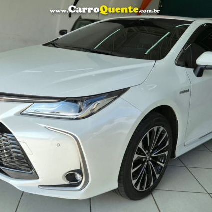 TOYOTA   COROLLA ALTIS PREM. 1.8 AUT. (HÍBRIDO)   BRANCO 2024 1.8 FLEX