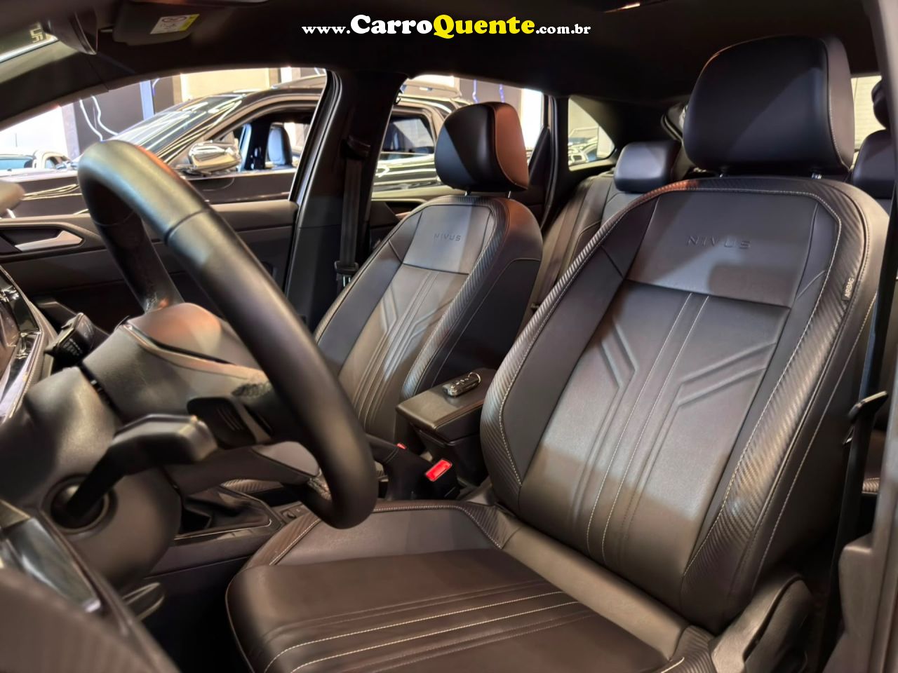 VOLKSWAGEN NIVUS 1.0 200 TSI TOTAL HIGHLINE 2025 - Loja