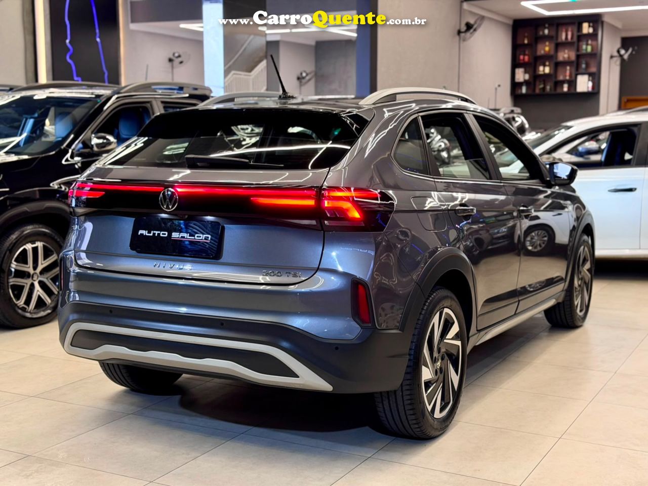 VOLKSWAGEN NIVUS 1.0 200 TSI TOTAL HIGHLINE 2025 - Loja