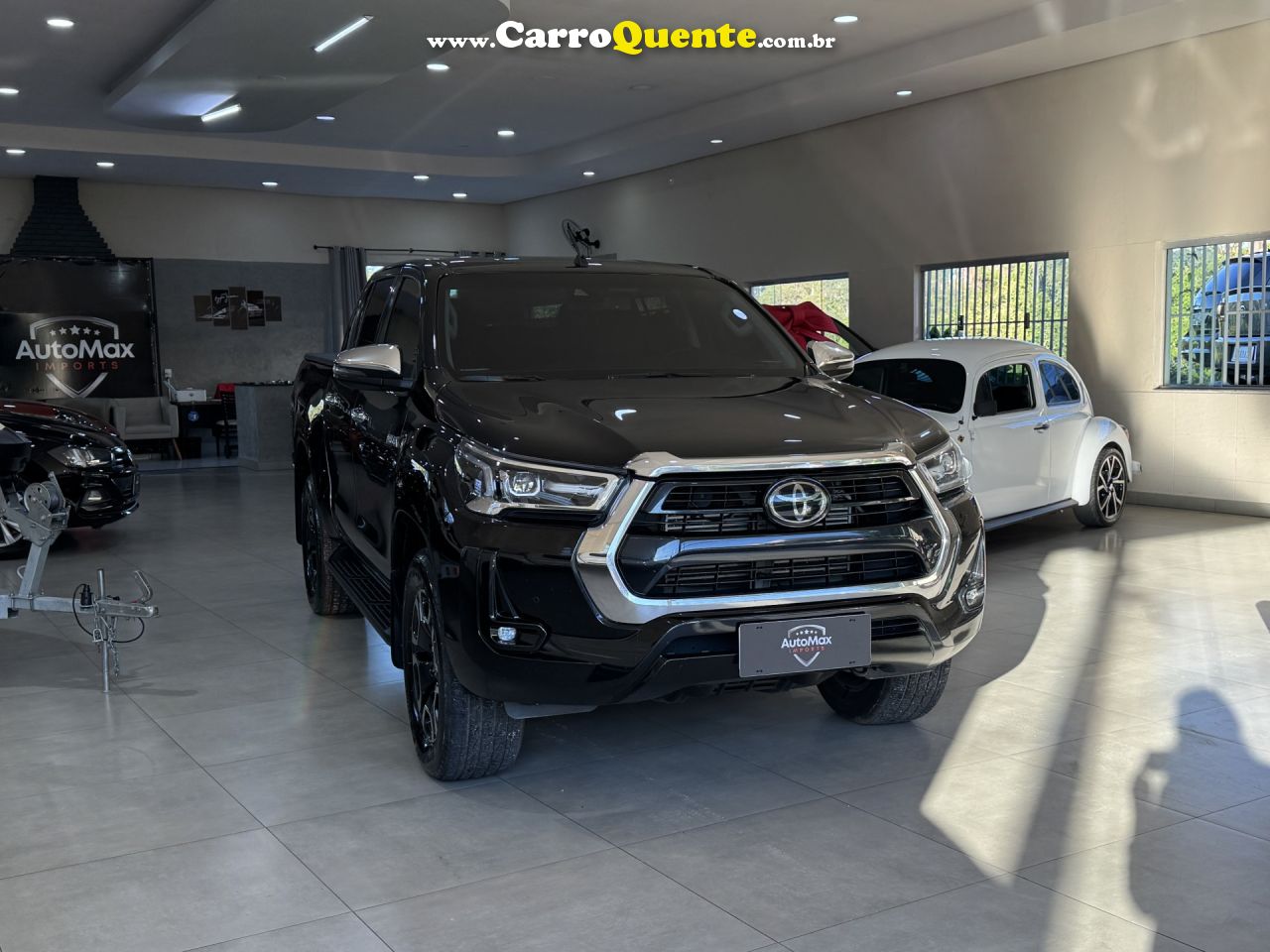 TOYOTA   HILUX CD SRX 4X4 2.8 TDI 16V DIESEL AUT.   PRETO 2021 2.8 DIESEL - Loja