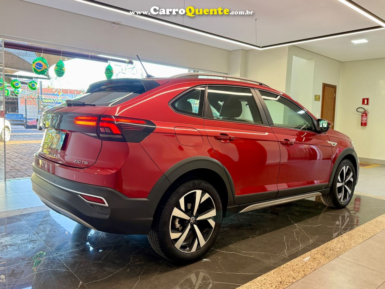 VOLKSWAGEN   NIVUS HIGHLINE 1.0 200 TSI FLEX AUT.   VERMELHO 2021 1.0 FLEX - Loja