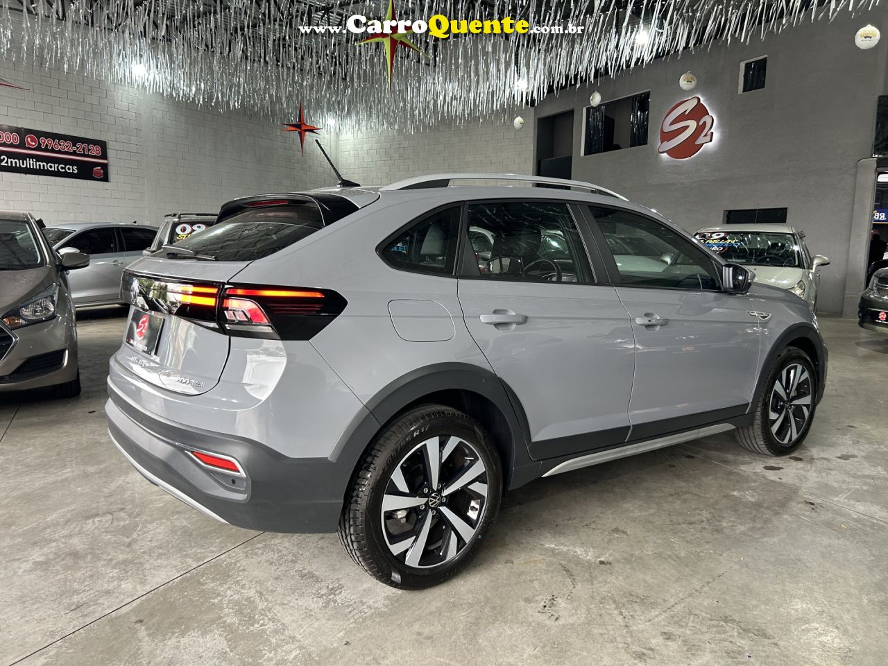 VOLKSWAGEN   NIVUS HIGHLINE 1.0 200 TSI FLEX AUT.   PRATA 2024 1.0 FLEX - Loja
