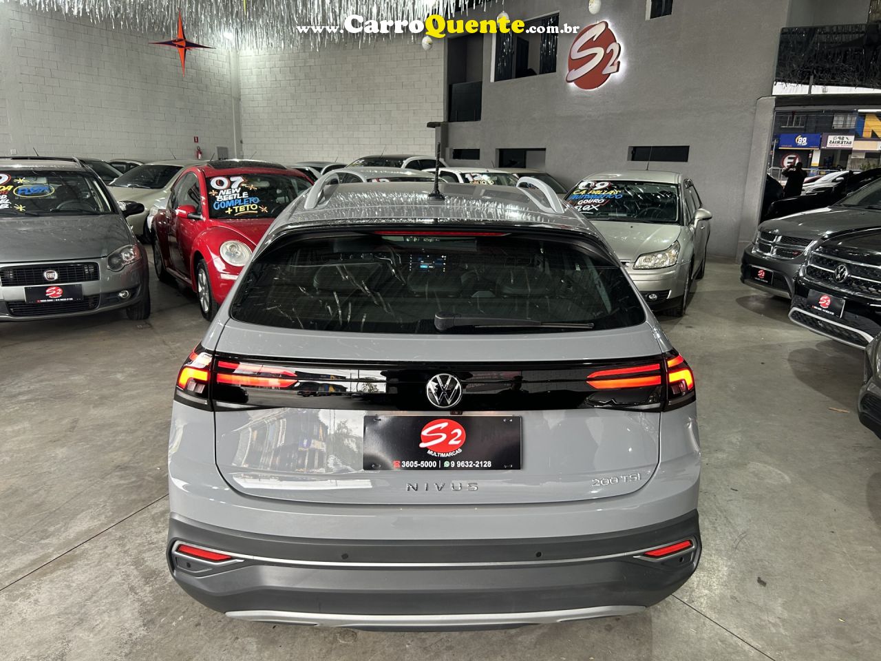 VOLKSWAGEN   NIVUS HIGHLINE 1.0 200 TSI FLEX AUT.   PRATA 2024 1.0 FLEX - Loja