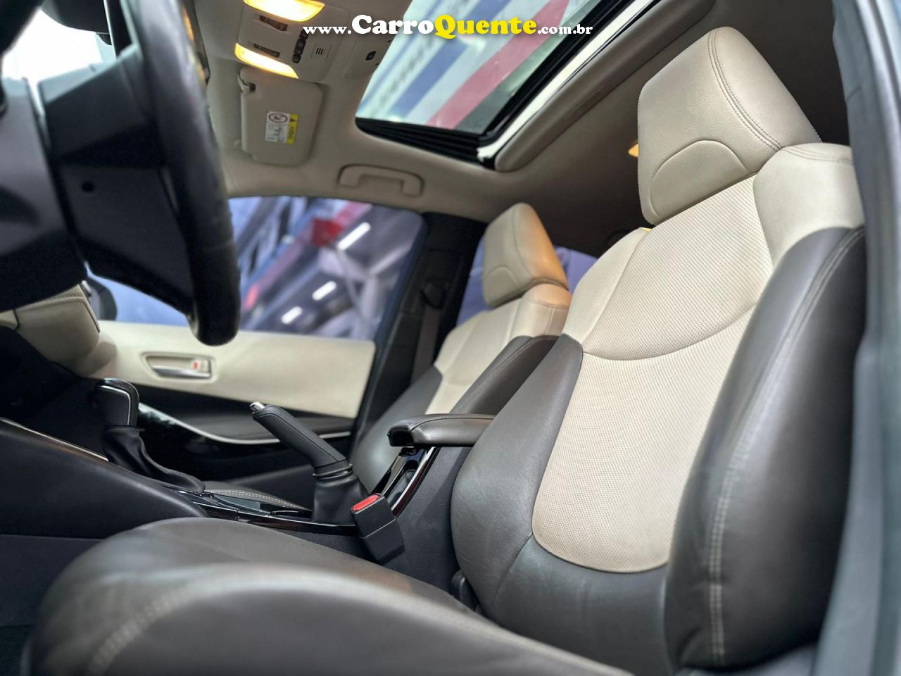 TOYOTA   COROLLA ALTIS PREM. 1.8 AUT. (HÍBRIDO)   CINZA 2020 1.8 FLEX E ELÉTRICO - Loja