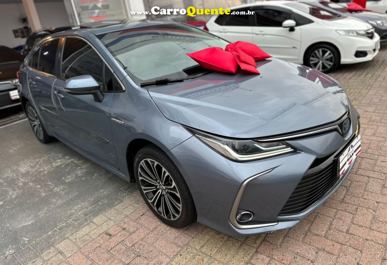 TOYOTA   COROLLA ALTIS PREM. 1.8 AUT. (HÍBRIDO)   CINZA 2020 1.8 FLEX E ELÉTRICO - Loja