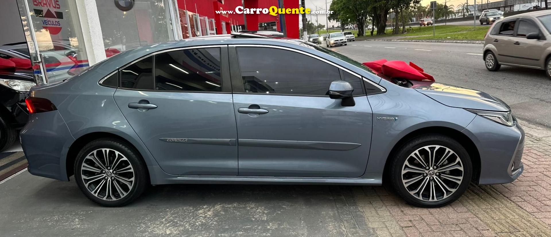 TOYOTA   COROLLA ALTIS PREM. 1.8 AUT. (HÍBRIDO)   CINZA 2020 1.8 FLEX E ELÉTRICO - Loja