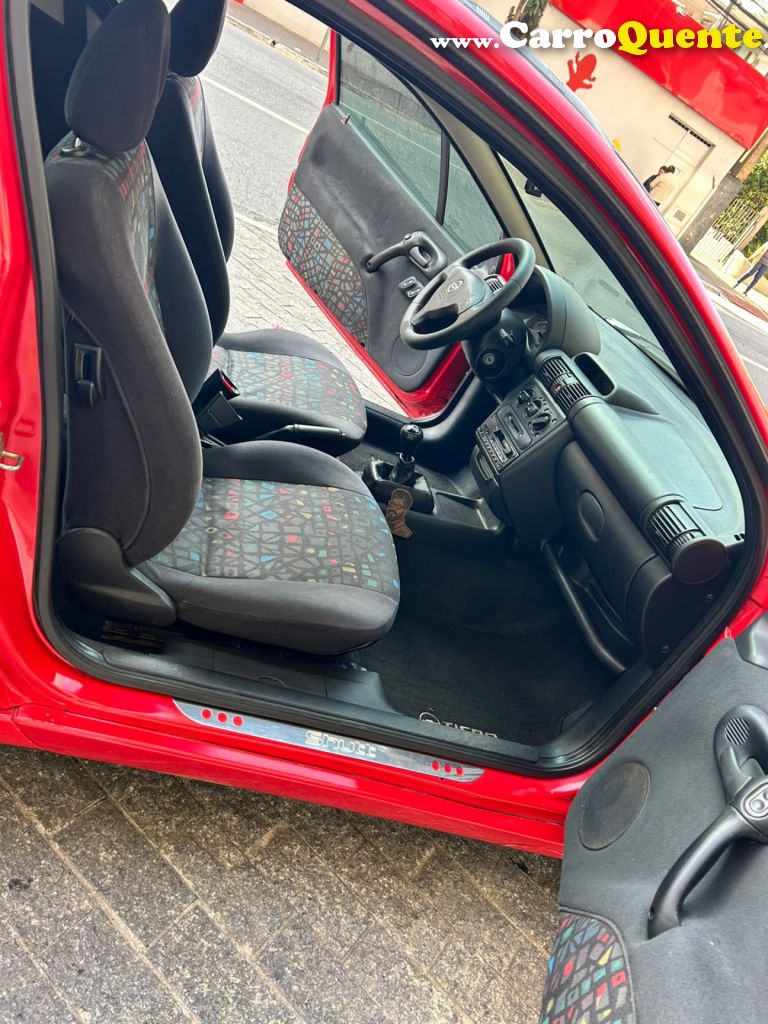 CHEVROLET   TIGRA 1.6 16V   VERMELHO 1998 1.6 GASOLINA - Loja