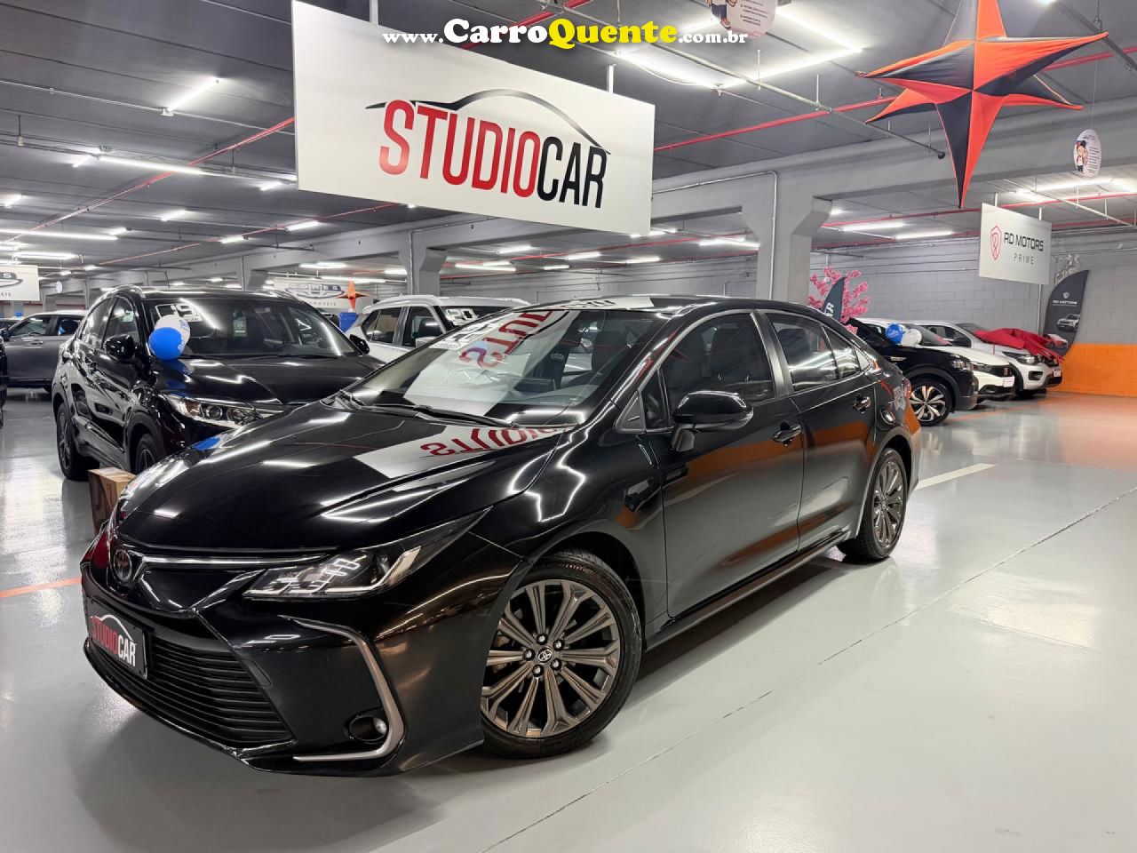 TOYOTA   COROLLA XEI 2.0 FLEX 16V AUT.   PRETO 2023 2.0 FLEX - Loja