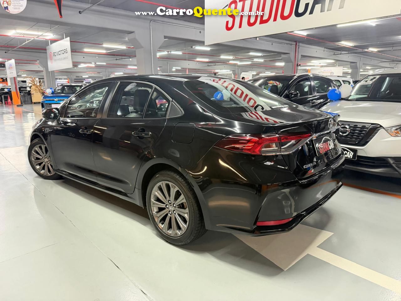 TOYOTA   COROLLA XEI 2.0 FLEX 16V AUT.   PRETO 2023 2.0 FLEX - Loja