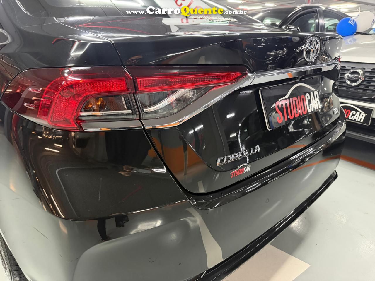 TOYOTA   COROLLA XEI 2.0 FLEX 16V AUT.   PRETO 2023 2.0 FLEX - Loja