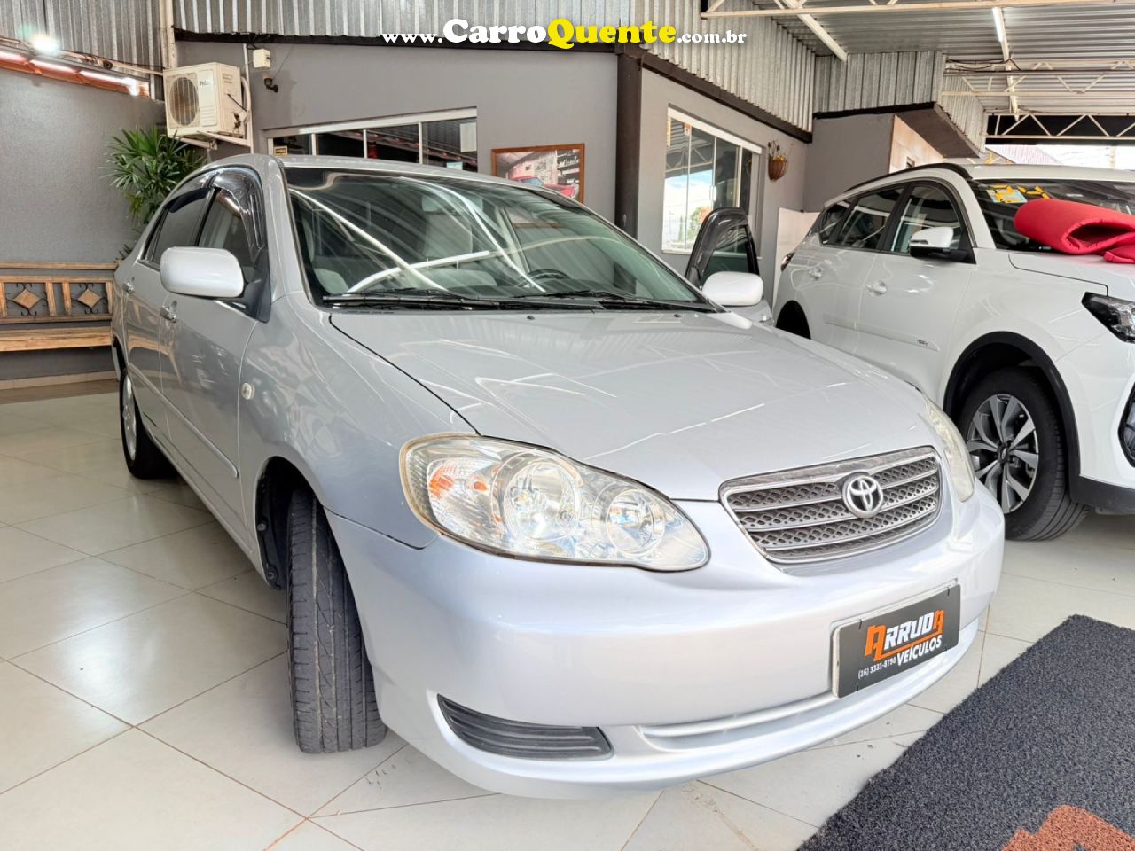 TOYOTA   COROLLA XEI 1.81.8 GAS 16V    PRATA 2006 1.8 GASOLINA - Loja