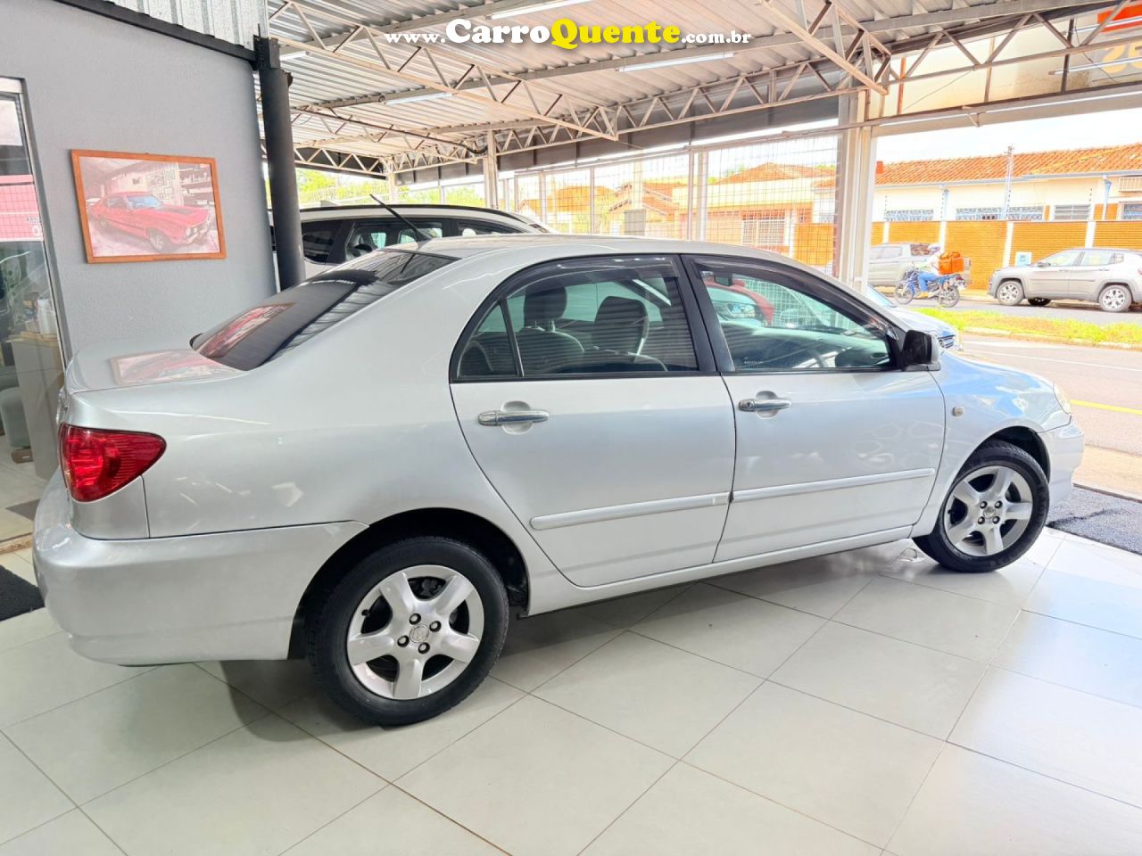 TOYOTA   COROLLA XEI 1.81.8 GAS 16V    PRATA 2006 1.8 GASOLINA - Loja
