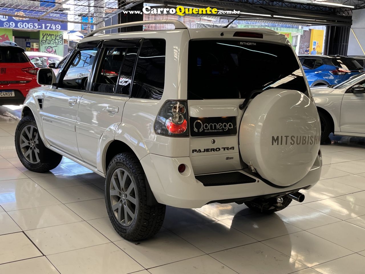 MITSUBISHI   PAJERO TR4 2.0 FLEX 16V 4X2 AUT.   BRANCO 2013 2.0 FLEX - Loja