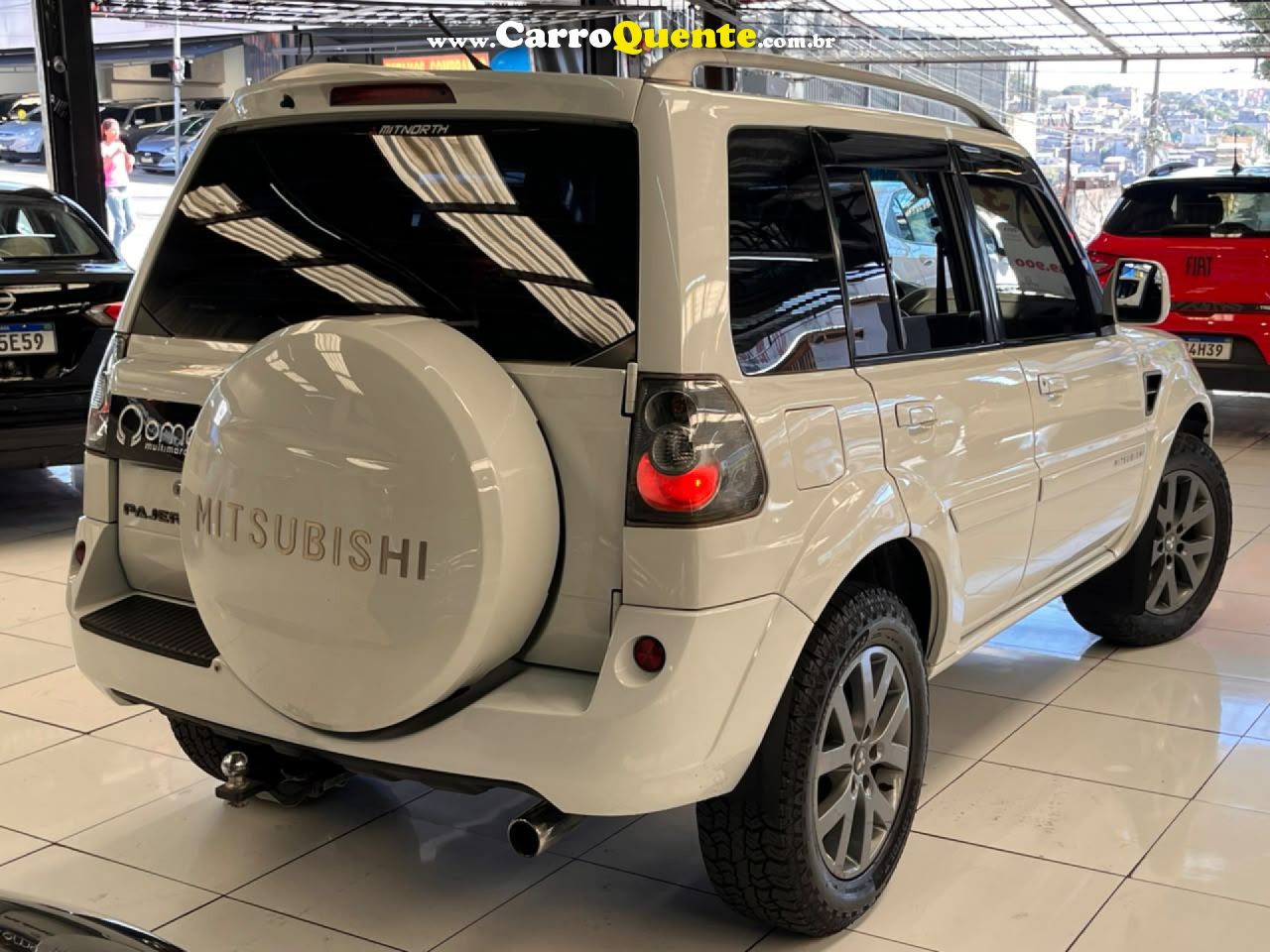 MITSUBISHI   PAJERO TR4 2.0 FLEX 16V 4X2 AUT.   BRANCO 2013 2.0 FLEX - Loja