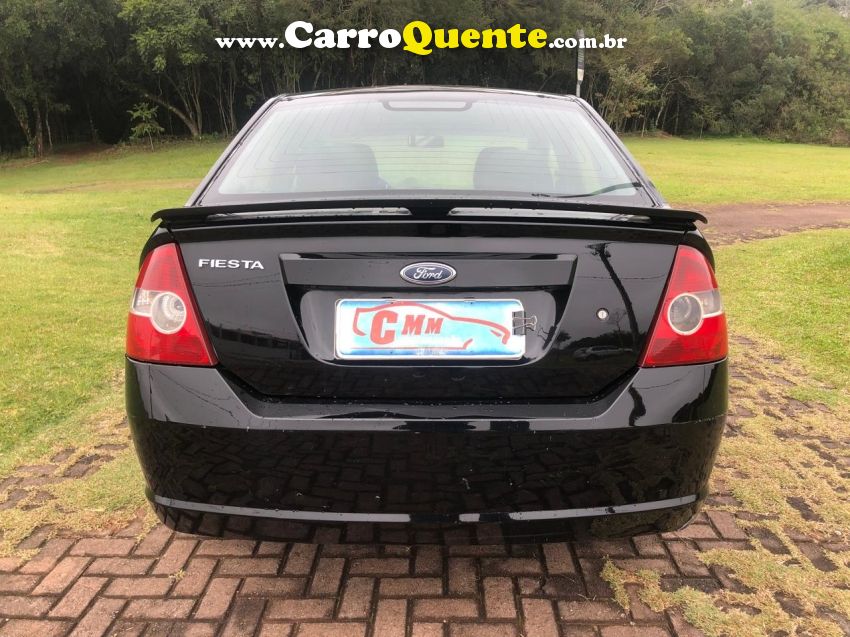 Ford FIESTA 1.0 MPI SEDAN 8V FLEX 4P MANUAL - Loja