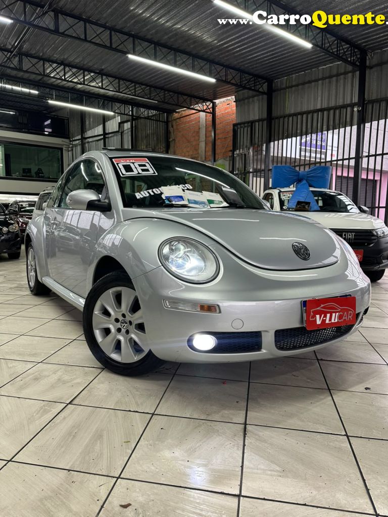 VOLKSWAGEN   NEW BEETLE 2.0 MI MEC.AUT.   PRATA 2008 2.0 GASOLINA - Loja