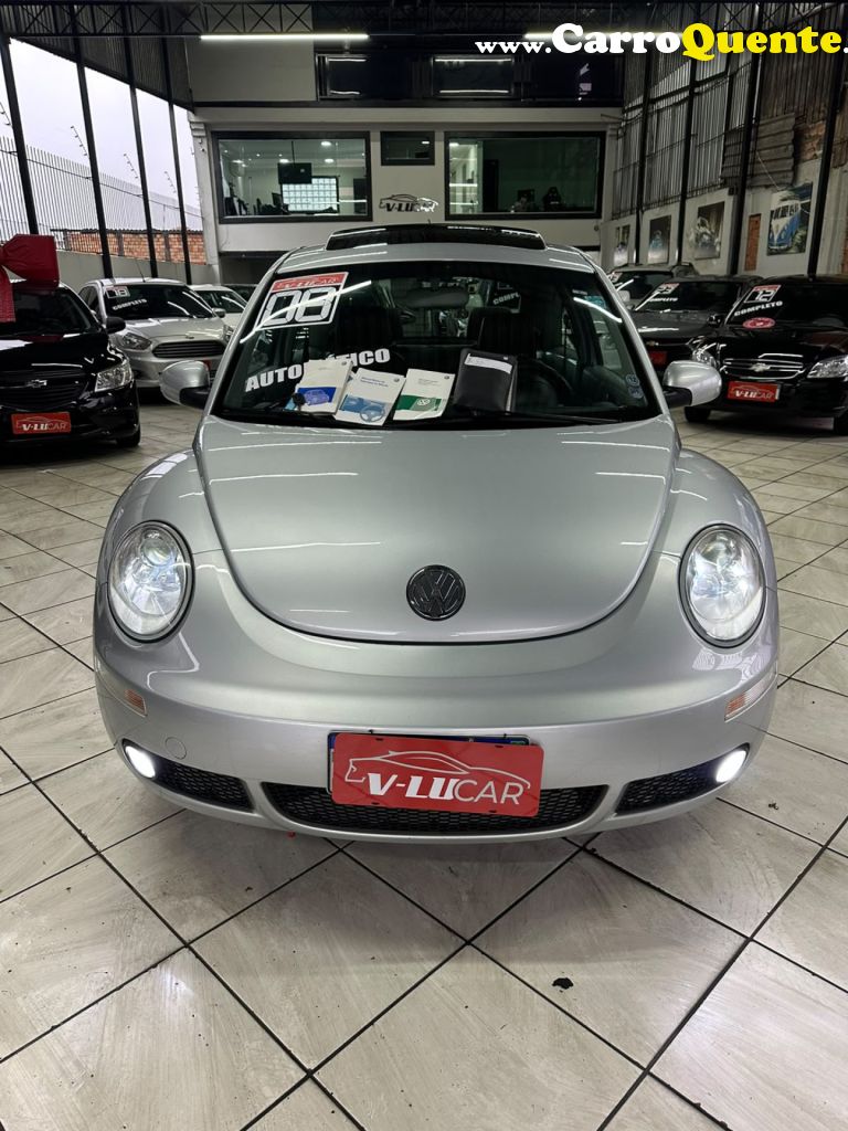 VOLKSWAGEN   NEW BEETLE 2.0 MI MEC.AUT.   PRATA 2008 2.0 GASOLINA - Loja