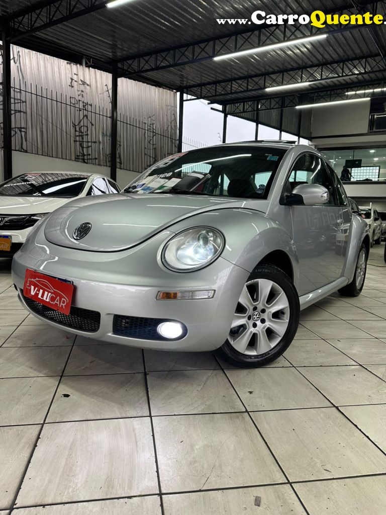 VOLKSWAGEN   NEW BEETLE 2.0 MI MEC.AUT.   PRATA 2008 2.0 GASOLINA - Loja