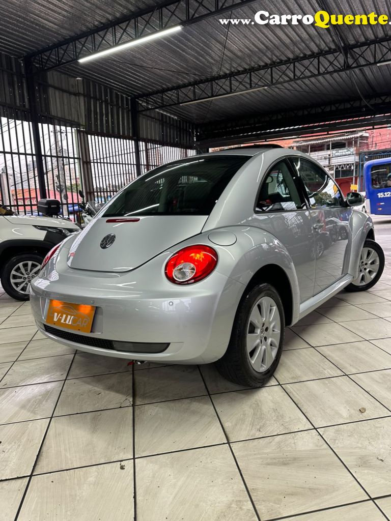 VOLKSWAGEN   NEW BEETLE 2.0 MI MEC.AUT.   PRATA 2008 2.0 GASOLINA - Loja