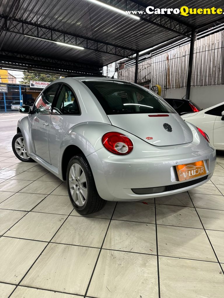 VOLKSWAGEN   NEW BEETLE 2.0 MI MEC.AUT.   PRATA 2008 2.0 GASOLINA - Loja