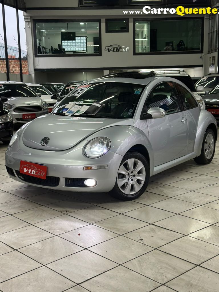 VOLKSWAGEN   NEW BEETLE 2.0 MI MEC.AUT.   PRATA 2008 2.0 GASOLINA - Loja