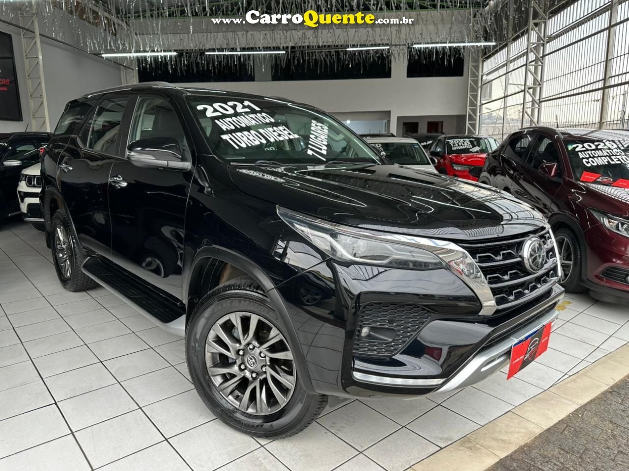 TOYOTA   HILUX SW4 SRX 4X4 2.8 TDI 16V DIES. AUT.   PRETO 2021 2.8 DIESEL - Loja