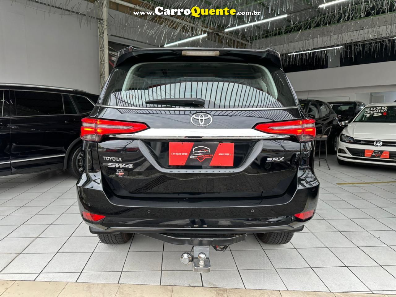 TOYOTA   HILUX SW4 SRX 4X4 2.8 TDI 16V DIES. AUT.   PRETO 2021 2.8 DIESEL - Loja