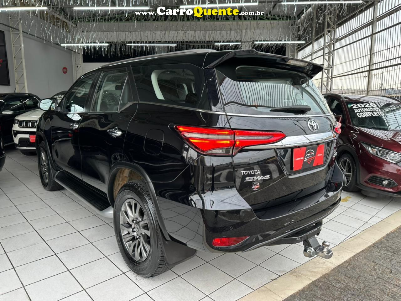 TOYOTA   HILUX SW4 SRX 4X4 2.8 TDI 16V DIES. AUT.   PRETO 2021 2.8 DIESEL - Loja