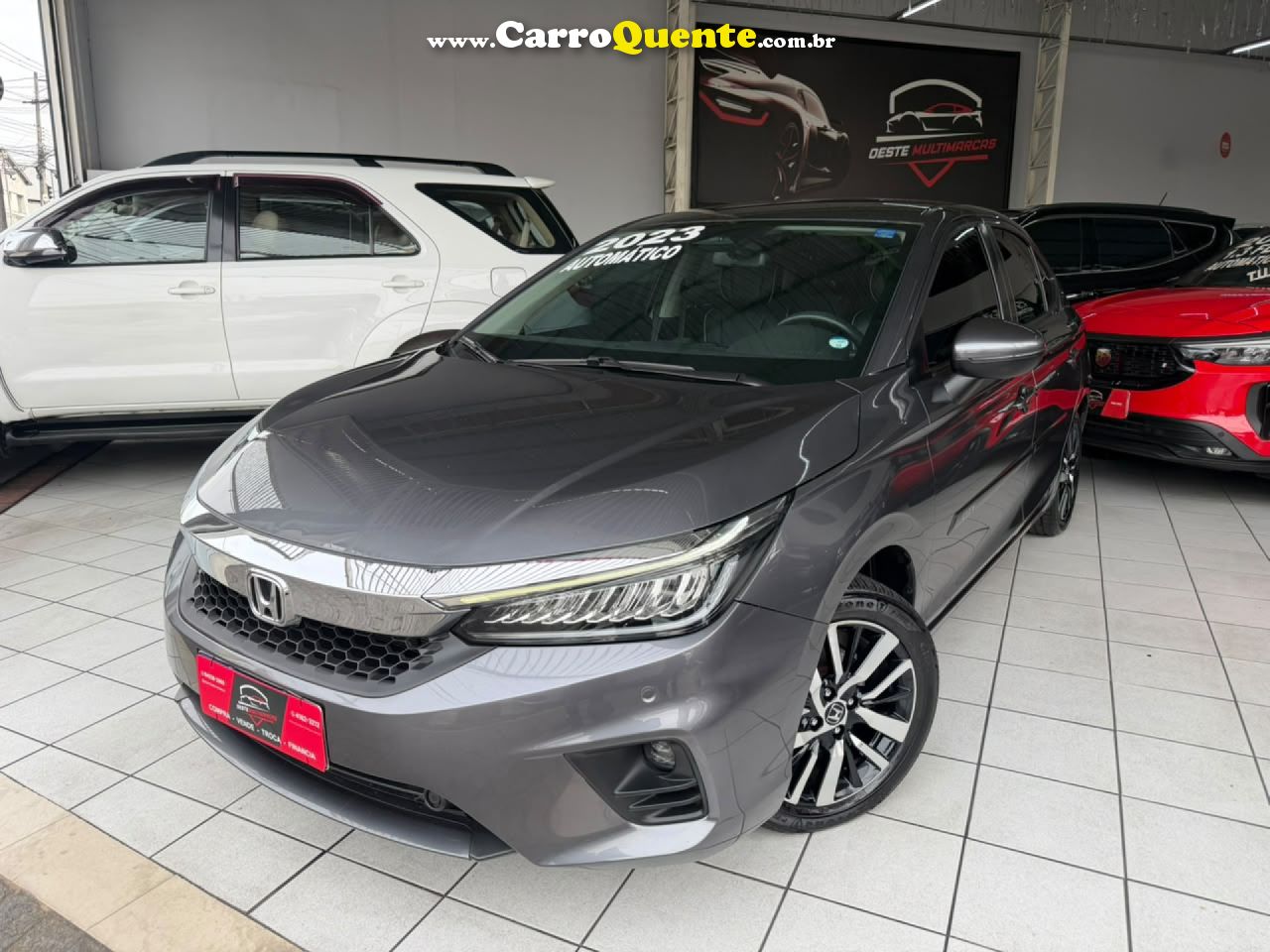 HONDA   CITY HATCHBACK TOURING 1.5 FLEX 16V AUT   CINZA 2023 1.5 FLEX - Loja