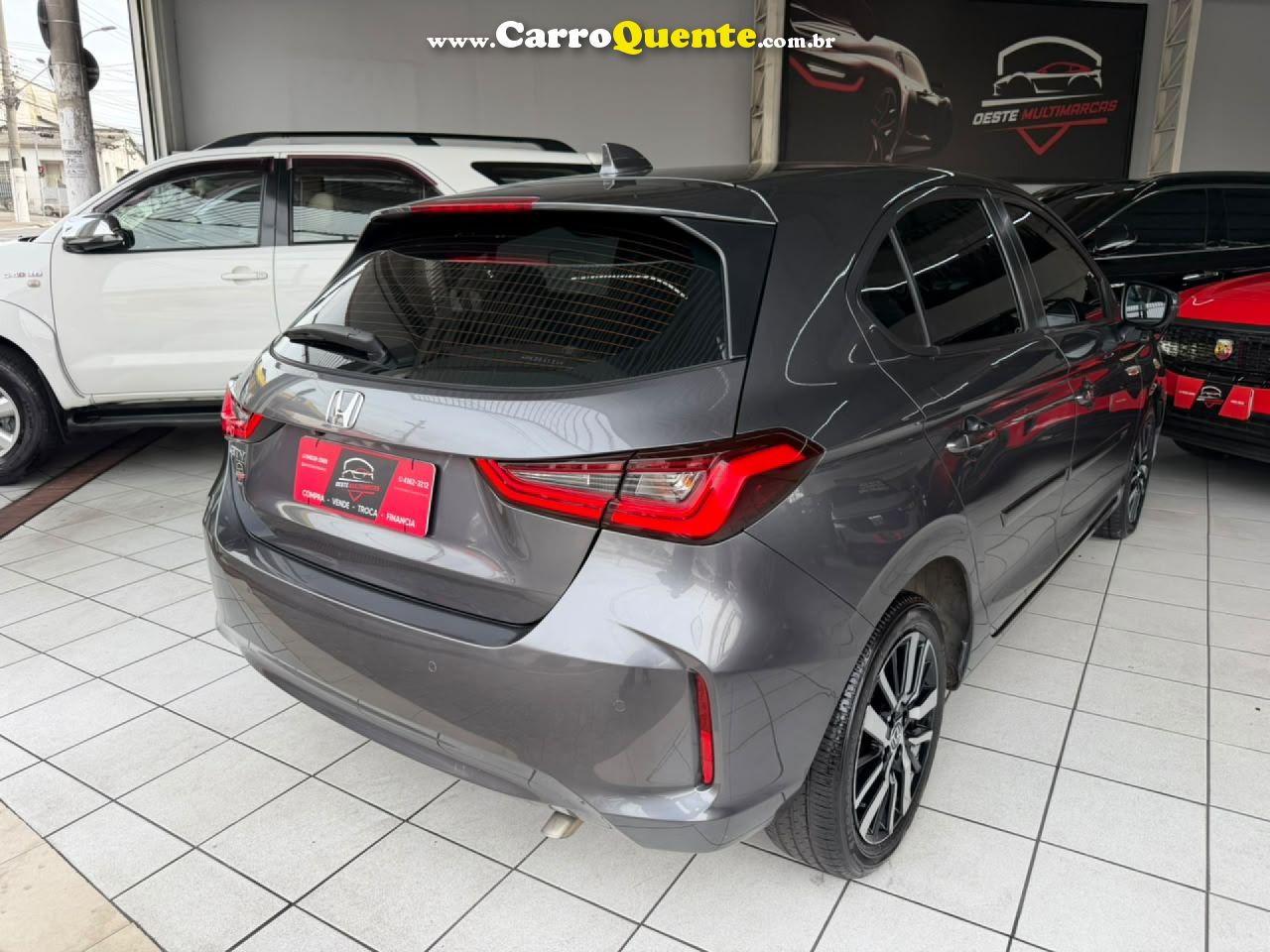 HONDA   CITY HATCHBACK TOURING 1.5 FLEX 16V AUT   CINZA 2023 1.5 FLEX - Loja