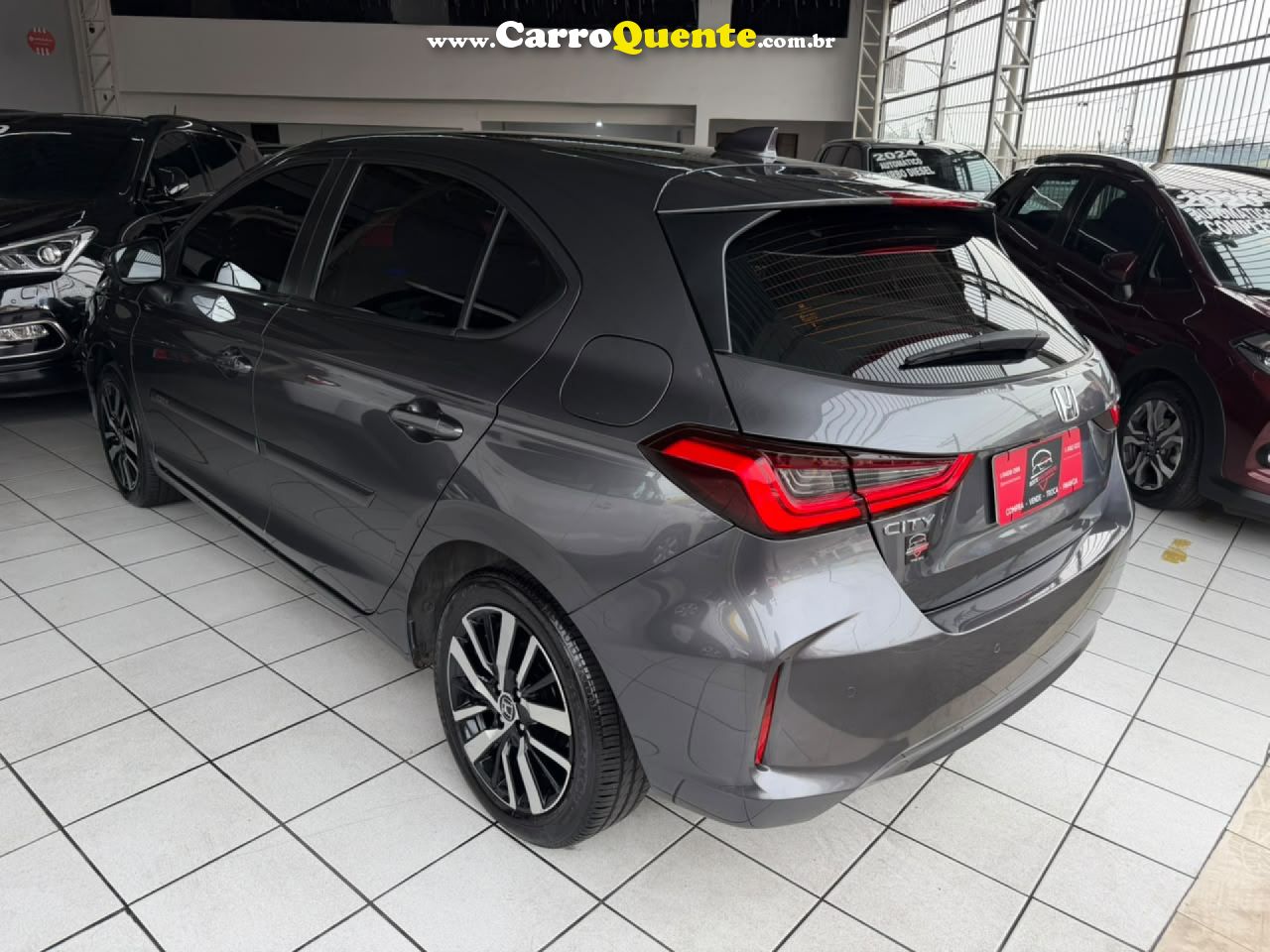 HONDA   CITY HATCHBACK TOURING 1.5 FLEX 16V AUT   CINZA 2023 1.5 FLEX - Loja