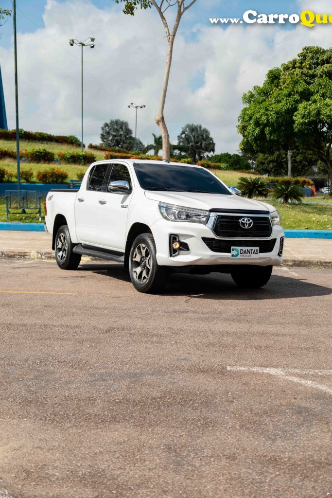 TOYOTA   HILUX CD SRX 4X4 2.8 TDI 16V DIESEL AUT.   BRANCO 2019 2.8 DIESEL - Loja