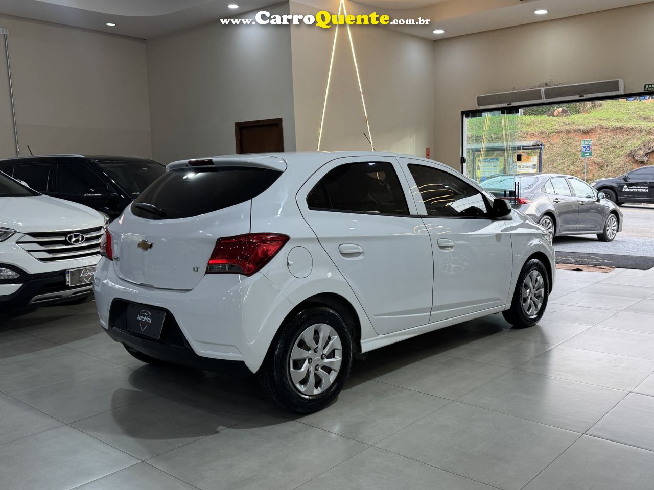 CHEVROLET   ONIX HATCH LT 1.0 8V FLEXPOWER 5P MEC.   BRANCO 2019 1.0 FLEX - Loja