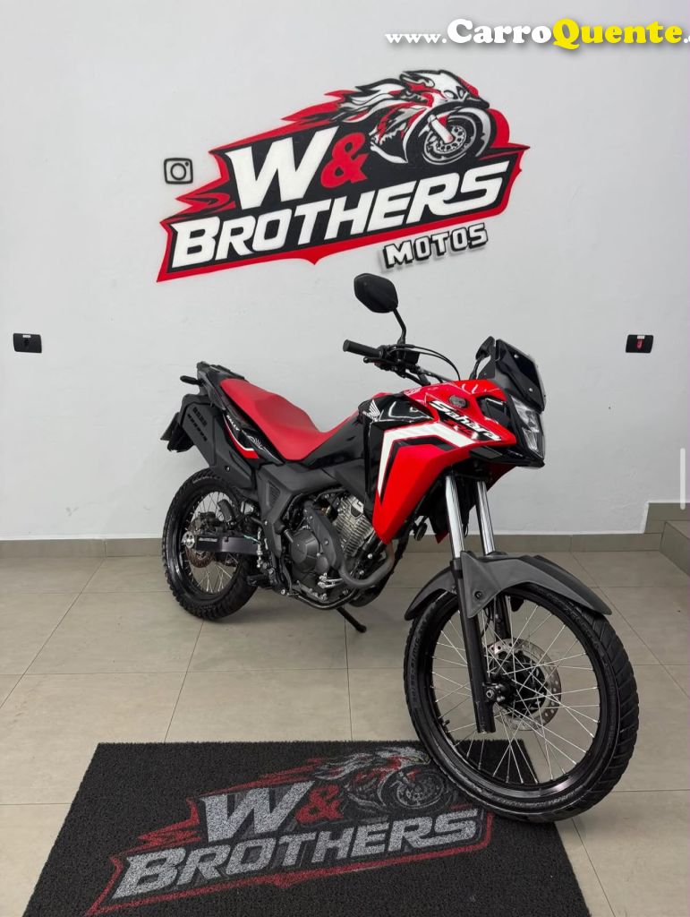 HONDA   HONDAXRE 300 SAHARA RAL   VERMELHO 2024 293 FLEX - Loja