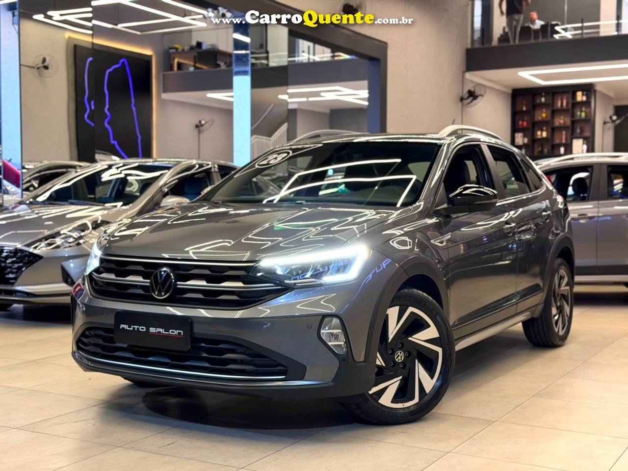 VOLKSWAGEN NIVUS 1.0 200 TSI TOTAL HIGHLINE 2023 - Loja