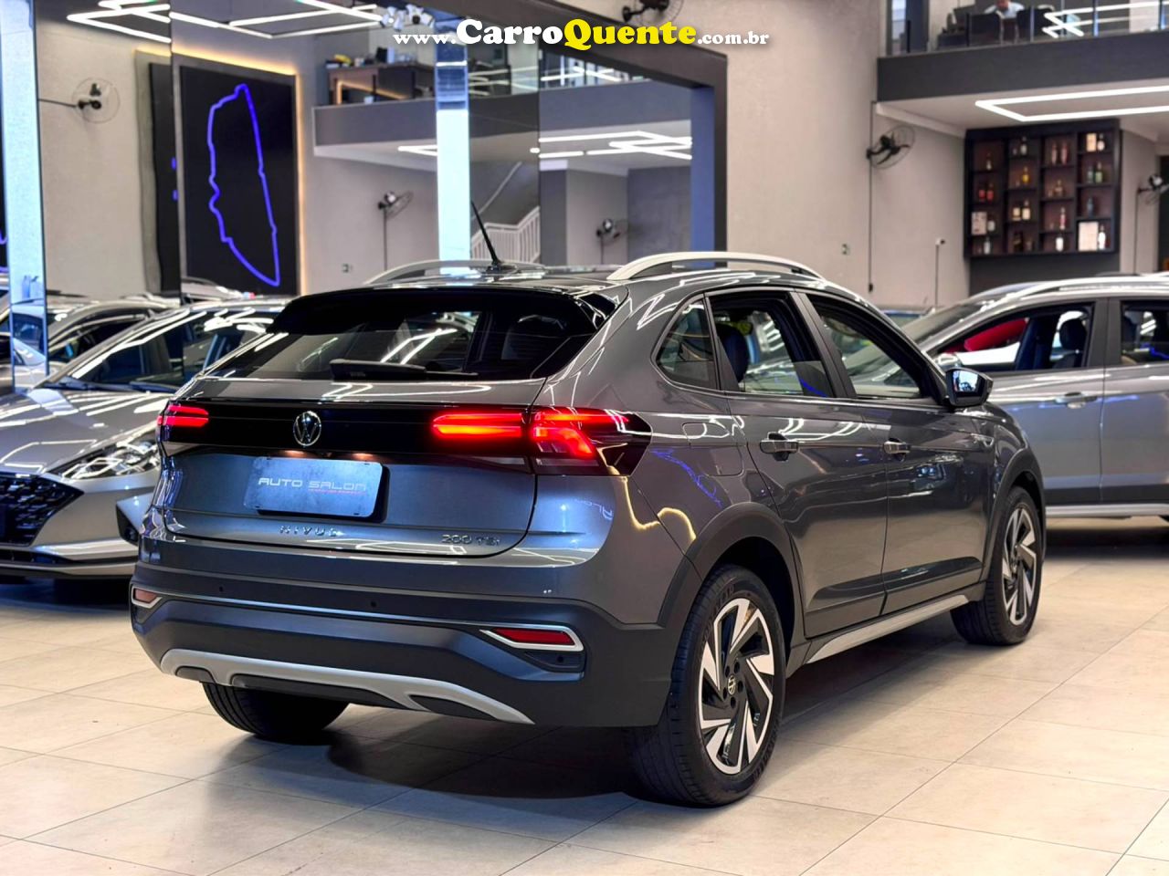 VOLKSWAGEN NIVUS 1.0 200 TSI TOTAL HIGHLINE 2023 - Loja